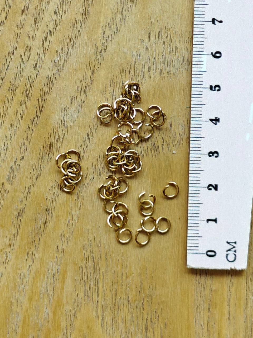 Välirengas 5mm, 18k kullattu kirurginteräs 50 kpl