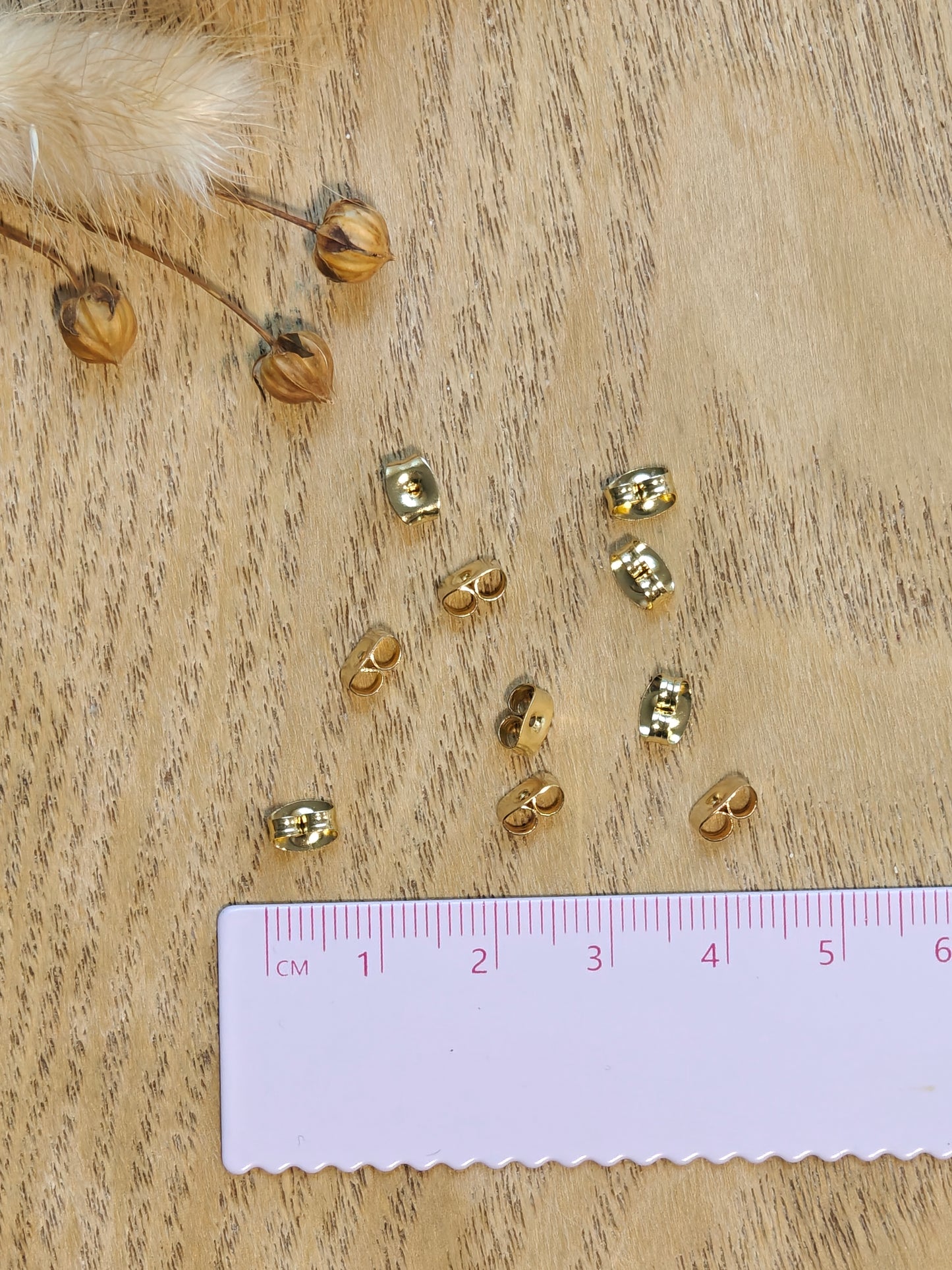 Korvakorun tausta ruostumatonteräs, 24k kultaus