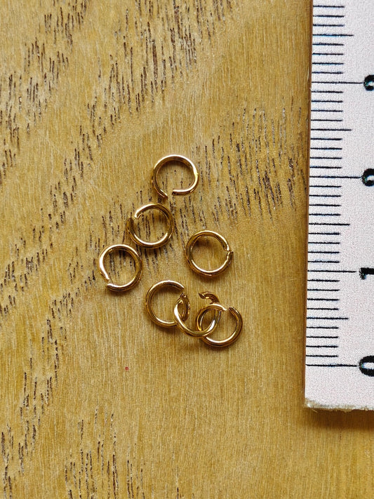 Välirengas 5mm, 18k kullattu kirurginteräs 50 kpl