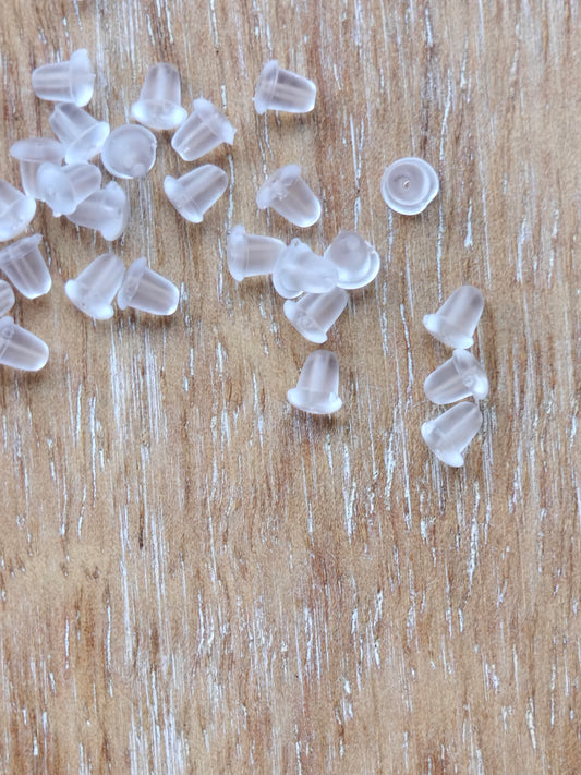 Silikoninen korvakorun tausta