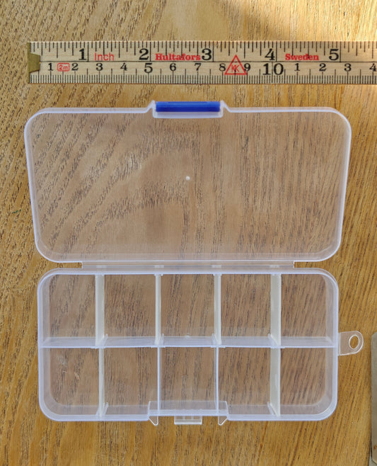 Pieni rasia korunosien tai kukkien säilyttämiseen